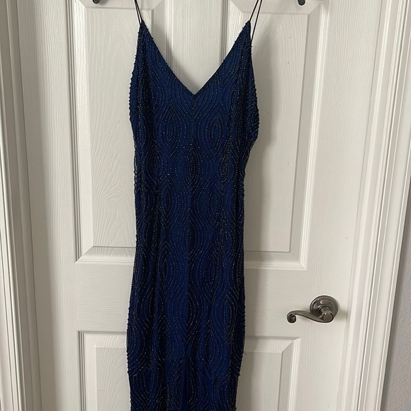 Beautiful formal beaded dress. Navy blue with a split on the front of the dress. - Picture 1 of 11